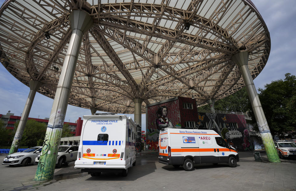 Camper vans are parked outside a cultural center on the outskirts of Milan, Italy, Wednesday, July 28, 2021, where people can receive the Johnson & Johnson vaccine for COVID-19. A camper van will tour Milan and the Lombardy region to provide easy vaccinations without bookings in an attempt to boost the vaccination campaign. Europe’s famed summer holiday season is in full swing, but efforts to inoculate people against coronavirus are not taking a break. From France’s Mediterranean coast to Italy’s Adriatic beaches, health authorities are trying to make a COVID-19 shot as much a part of this summer as sunscreen and shades. (AP Photo/Antonio Calanni)