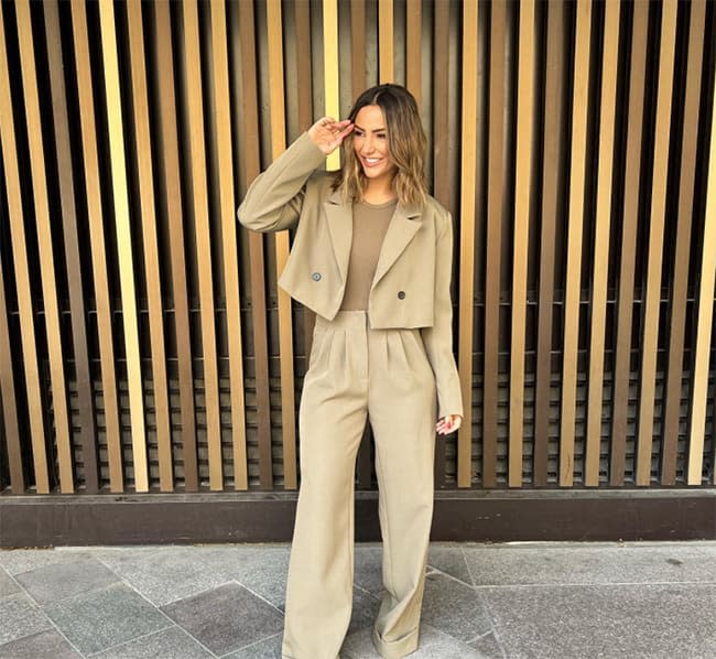 Frankie Bridge in beige pantsuit