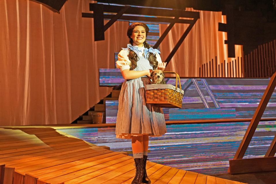 Maddy Moore plays "Dorothy Gale" and Scrappy plays "Toto" in "The Wizard of Oz," on stage at Titusville Playhouse through Dec. 10, 2023. Visit titusvilleplayhouse.com.
