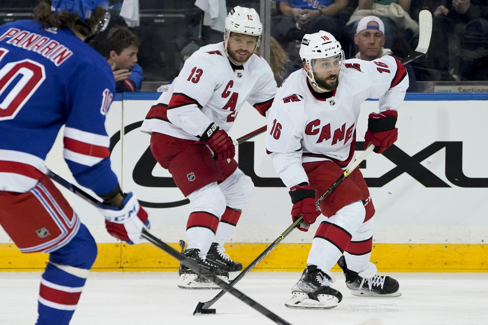 Carolina Hurricanes center Vincent Trocheck (16) sets up a shot on goal during the second period of Game 6 of an NHL hockey Stanley Cup second-round playoff series against the New York Rangers, Saturday, May 28, 2022, in New York. (AP Photo/John Minchillo)