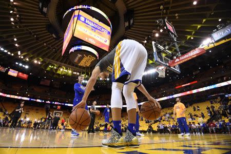 May 11, 2016; Oakland, CA, USA; Golden State Warriors guard Stephen Curry (30) warms up before game five of the second round of the NBA Playoffs against the Portland Trail Blazers at Oracle Arena. Mandatory Credit: Kyle Terada-USA TODAY Sports