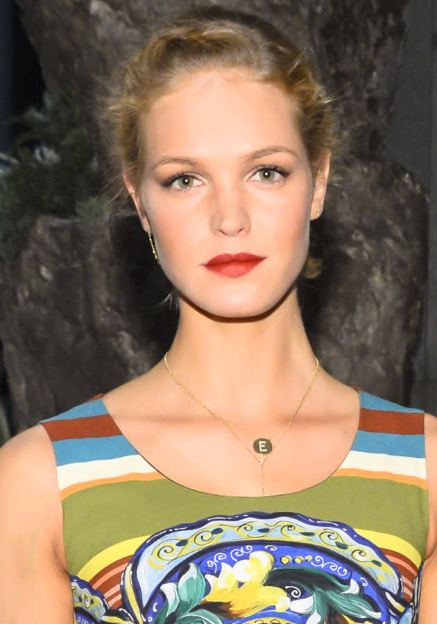Celebrities wearing red lipstick: Erin Heatherton showed off her pout with an up-do.<br><br>[Rex]