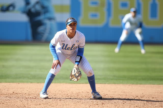<p>Katharine Lotze/Getty</p> Maya Brady #7 of the UCLA Bruins looks on during a game against the Stanford Cardinal at Easton Stadium on April 02, 2023 in Los Angeles, California.