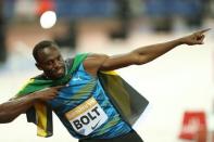 Athletics - IAAF Diamond League 2015 - Sainsbury's Anniversary Games - Queen Elizabeth Olympic Park, London, England - 24/7/15 Jamaica's Usain Bolt celebrates after winning the Mens' 100m Action Images via Reuters / Matthew Childs Livepic