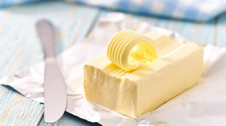 Stick of unwrapped butter