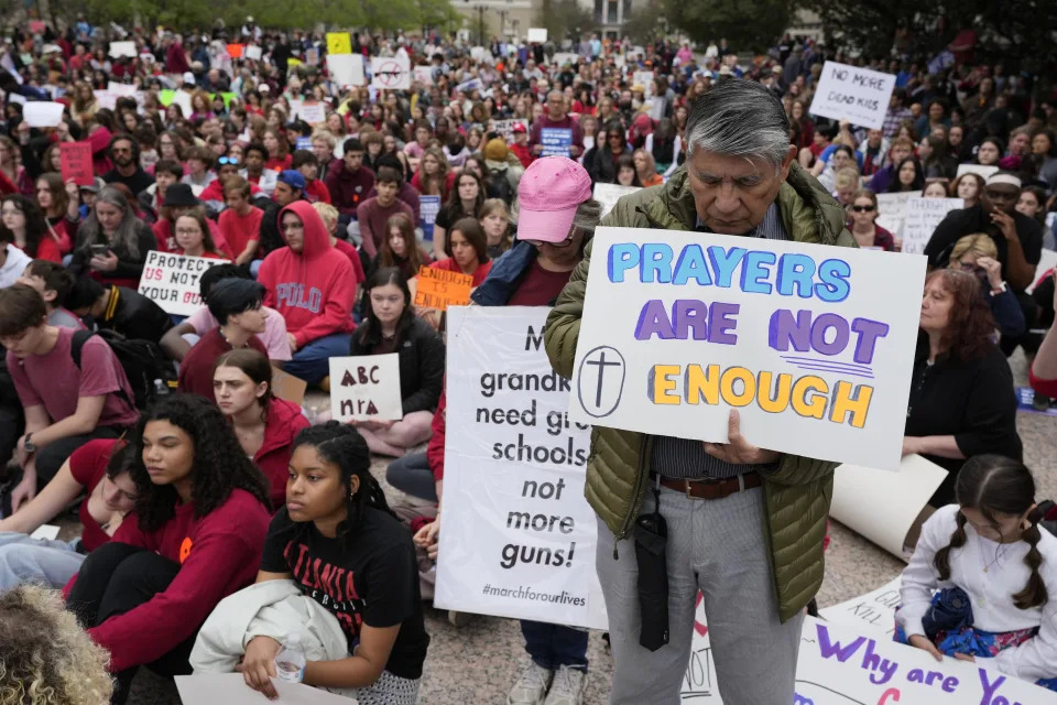 Josia Arteaga, front right, takes part in the March for Our Lives anti gun protest outside the State Capitol in Nashville, Tenn., on Monday, April 3, 2023. (AP Photo/George Walker IV)