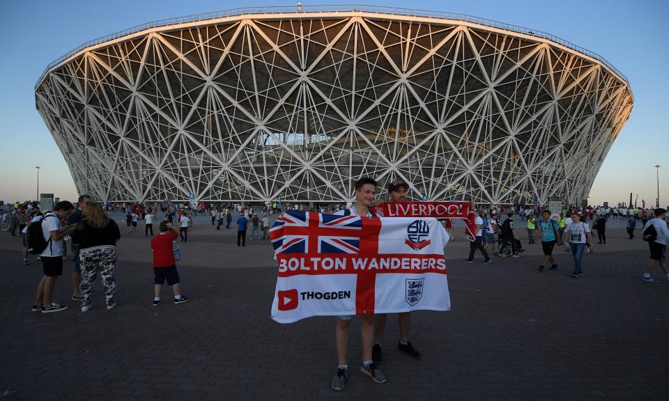 England fans gather outside the Volgograd Arena before kick-off against Tunisia. England’s first game passed off without incident despite fears of violence.