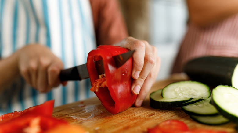 Closeup of cutting peppers