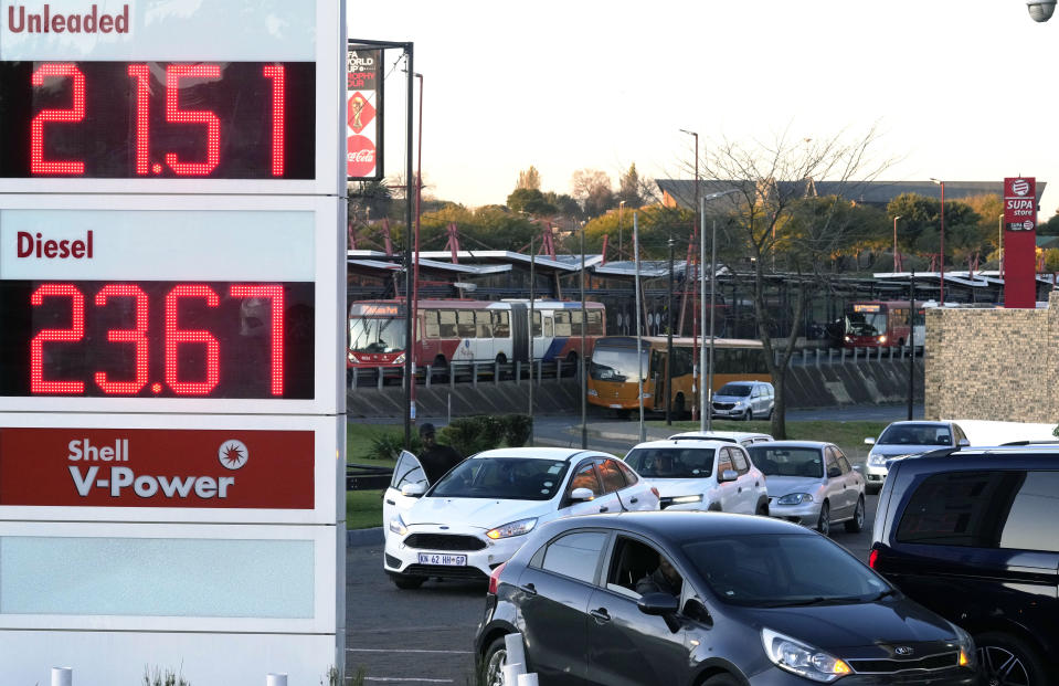 Motorists queue for fuel ahead of the fuel price increase, in Soweto, South Africa, Tuesday, May 31, 2022. (AP Photo/Themba Hadebe)