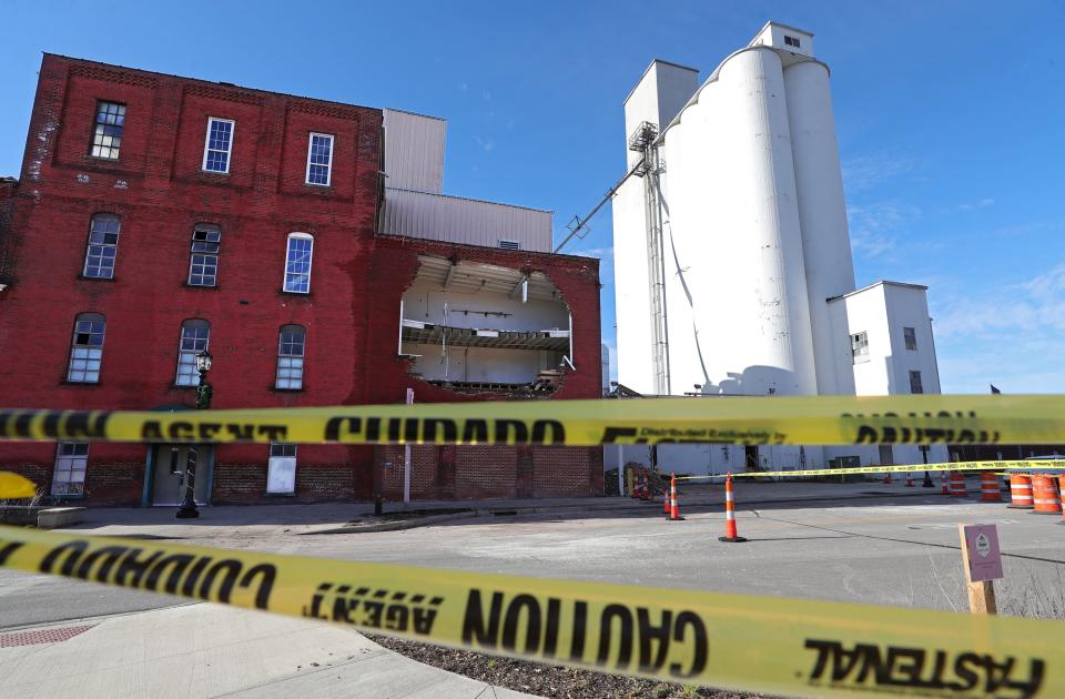 A section of the facade of the former Star of the West Milling Co. building in Kent is now missing after a large structure fire.