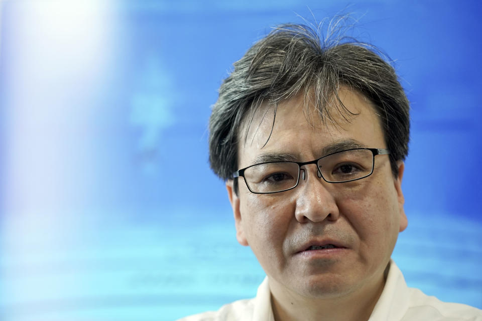 FILE - In this Aug. 14, 2019, file photo, Masaru Tonomura, a history professor at the University of Tokyo speaks during an interview with the Associated Press in Tokyo. The modern legacy of a dark chapter in Japan’s history, when hundreds of thousands of people were brought from the Korean Peninsula and other Asian nations to work in logging, in mines, on farms and in factories as forced labor, lives on in the companies that came to dominate the Japanese economy after World War II. Many of those companies are still facing demands for compensation that they say were settled by treaty decades ago. “Japanese have never seriously faced up to the realities of the devastating abuse Japan brought to neighboring nations and their people,” said Tonomura. (AP Photo/Eugene Hoshiko, File)