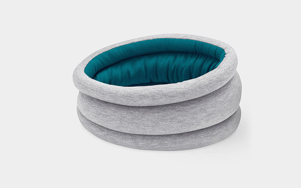 <p>For road warriors who seek maximum comfort on the go, <a rel="nofollow noopener" href="http://www.travelandleisure.com/style/travel-accessories/best-travel-pillows" target="_blank" data-ylk="slk:travel pillows;elm:context_link;itc:0;sec:content-canvas" class="link ">travel pillows</a> can be life changing—and this one is no exception. Consider this variation for only your most shameless friends and family.</p> <p>To buy: <a rel="nofollow noopener" href="http://www.anrdoezrs.net/links/7876402/type/dlg/sid/TLFASsheL150Under50GiftGuideEO11016/https://www.bedbathandbeyond.com/store/product/ostrich-pillow-ultimate-travel-pillow-light/3259558?Keyword=ostrich+pillow" target="_blank" data-ylk="slk:A;elm:context_link;itc:0;sec:content-canvas" class="link ">A</a><a rel="nofollow noopener" href="https://www.amazon.com/Ostrich-Pillow-Light-Sleepy-Blue/dp/B01EV1T1TY/ref=pd_bxgy_21_img_2" target="_blank" data-ylk="slk:mazon;elm:context_link;itc:0;sec:content-canvas" class="link ">mazon</a>, $40</p>