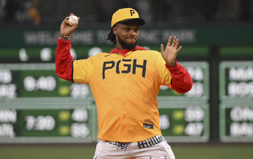 Buffalo Bills safety Damar Hamlin throws out a first pitch before a baseball game between the Pittsburgh Pirates and the San Diego Padres, Tuesday, June 27, 2023, in Pittsburgh. (AP Photo/Justin Berl)