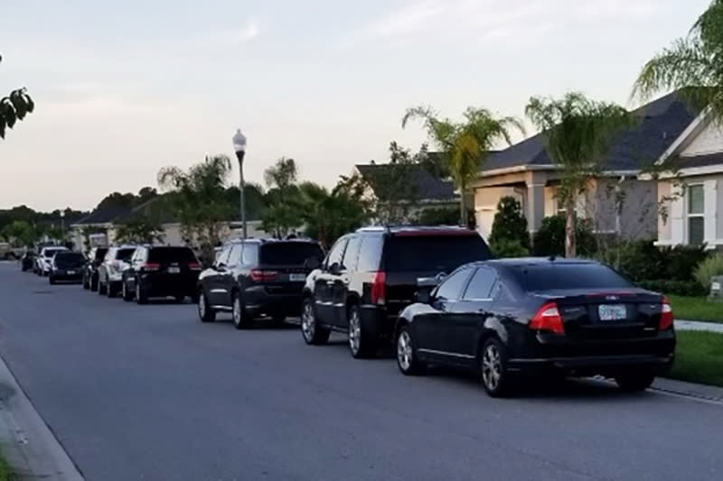 Secret Service cars parked out front of their New Smyrna Beach house when they went there to arrest them. (Obtained by NBC News)