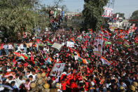 <p>Supporters stand on a tree as others squeeze in a crowd for a joint election campaign by Uttar Pradesh state Chief Minister Akhilesh Yadav and Congress party Vice President Rahul Gandhi in Allahabad, India , Tuesday, Feb. 21, 2017. Uttar Pradesh and four other Indian states are having state legislature elections in February-March, a key mid-term test for Prime Minister Narendra Modi’s Hindu nationalist government which has been ruling India since 2014. (AP Photo/Rajesh Kumar Singh) </p>