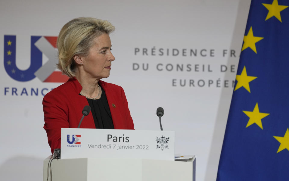 European Commission President Ursula von der Leyen listens to questions from journalists as she participates in a media conference with French President Emmanuel Macron after a meeting at the Elysee Palace in Paris, France, Friday, Jan. 7, 2022. (AP Photo/Michel Euler, Pool)