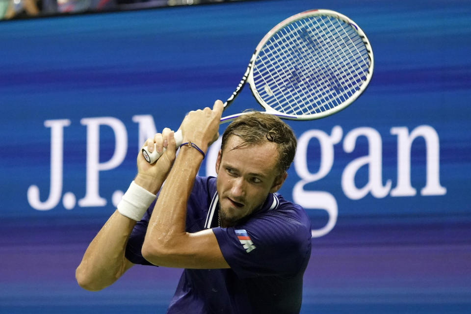 Daniil Medvedev, of Russia, returns a shot against Richard Gasquet, of France, during the first round of the US Open tennis championships, Monday, Aug. 30, 2021, in New York. (AP Photo/Elise Amendola)
