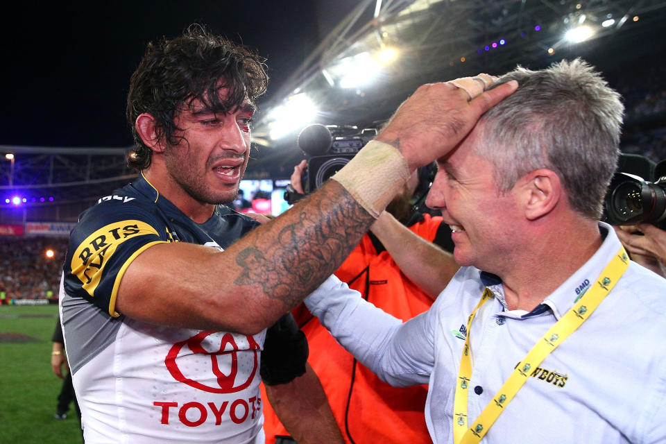 Johnathan Thurston, pictured here embracing Paul Green after the 2015 NRL grand final.