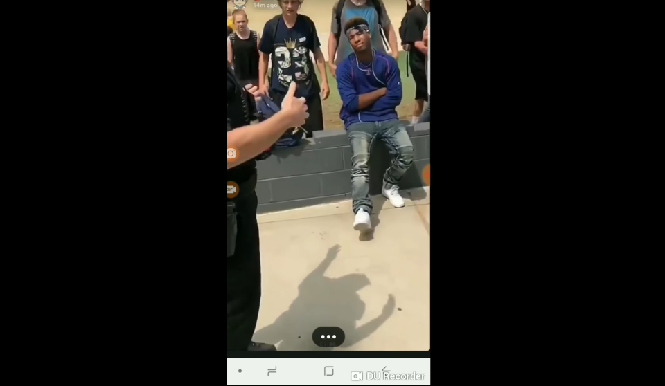 A high school student named Valentino says a teacher at Apache Junction High School in Arizona called the police on him for not removing his bandana. (Photo: YouTube/my lil woody)