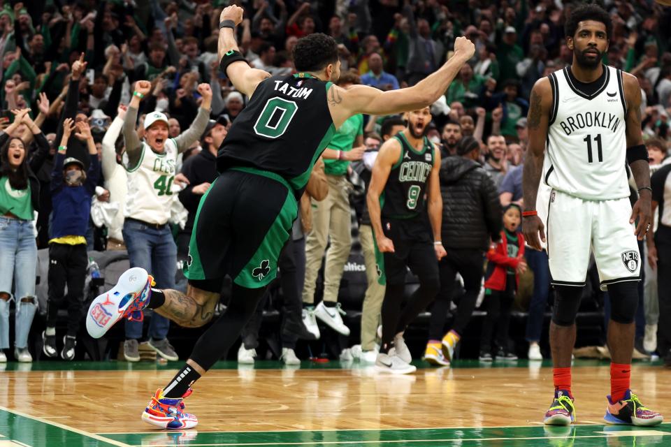 Celtics star Jayson Tatum celebrates his game-winning layup against the Nets.