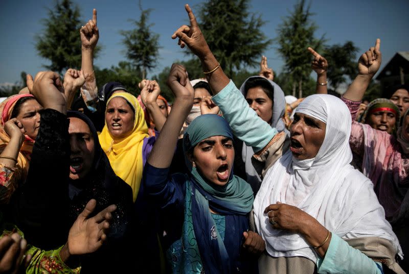 FILE PHOTO: Kashmiri women attend a protest after Eid-al-Adha prayers at a mosque during restrictions after the scrapping of the special constitutional status for Kashmir by the Indian government, in Srinagar