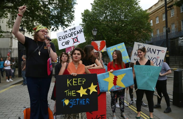 A small group of anti-Brexit demonstrators protest opposite Downing Street in central London following the UK's decision to leave the EU