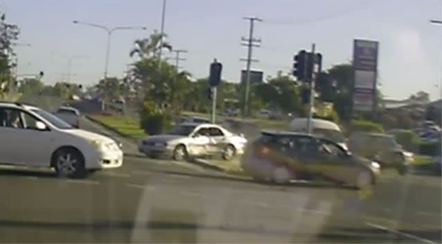 The silver cars slammed into a pole after it was hit in the side by a black car. Photo: Facebook/Dash Cam Owners Australia