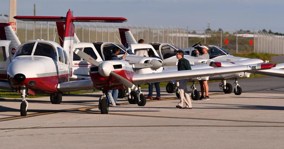 FIT Aviation flight instructors and student pilots prepare for takeoff Friday morning from Melbourne Orlando International Airport to Naples Airport on a Hurricane Ian relief mission.