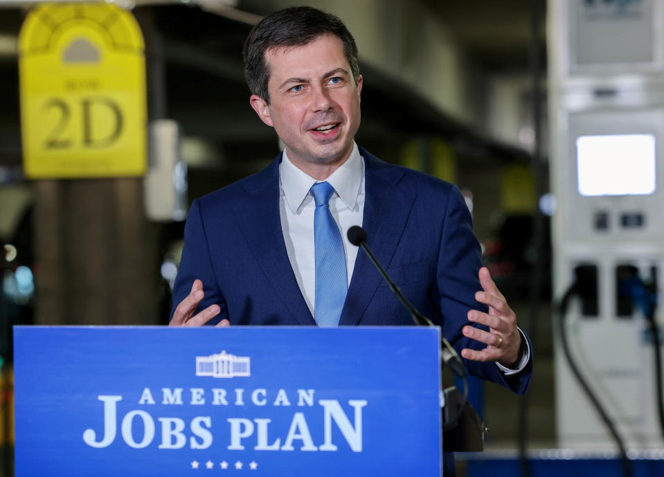 U.S. Transportation Secretary Pete Buttigieg speaks at a news conference in the parking garage at Union Station in front of new EV charging stations in Washington, U.S., April 22, 2021. REUTERS/Evelyn Hockstein