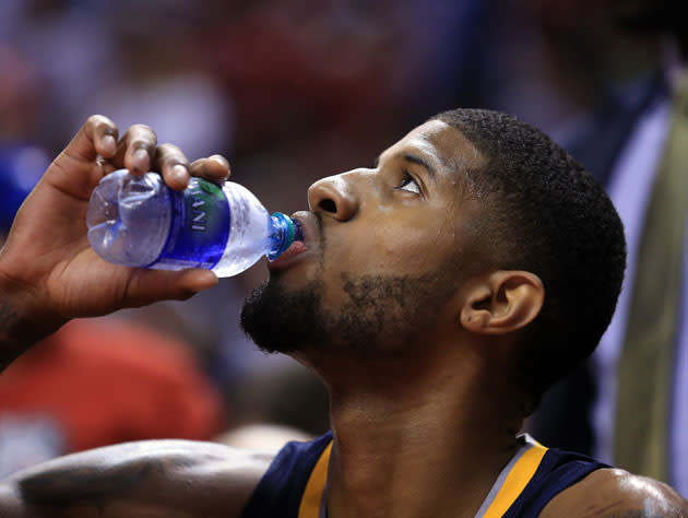 Paul George pauses, refreshes. (Getty)