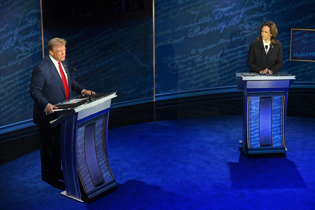 US Vice President and Democratic presidential candidate Kamala Harris listens as former US President and Republican presidential candidate Donald Trump speaks during a presidential debate at the National Constitution Center in Philadelphia, Pennsylvania, on September 10, 2024.