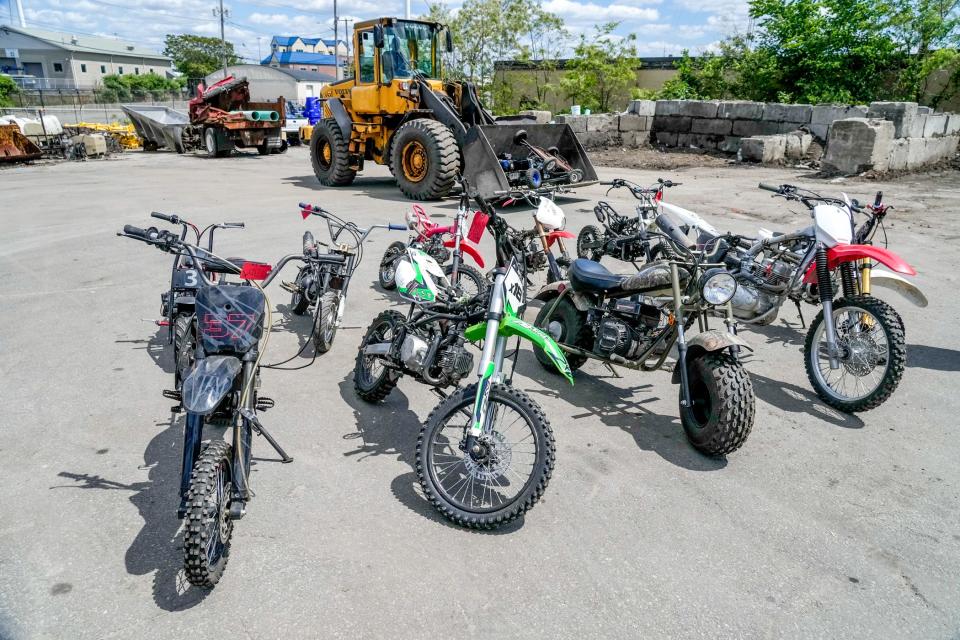 Seized dirt bikes await their fate.