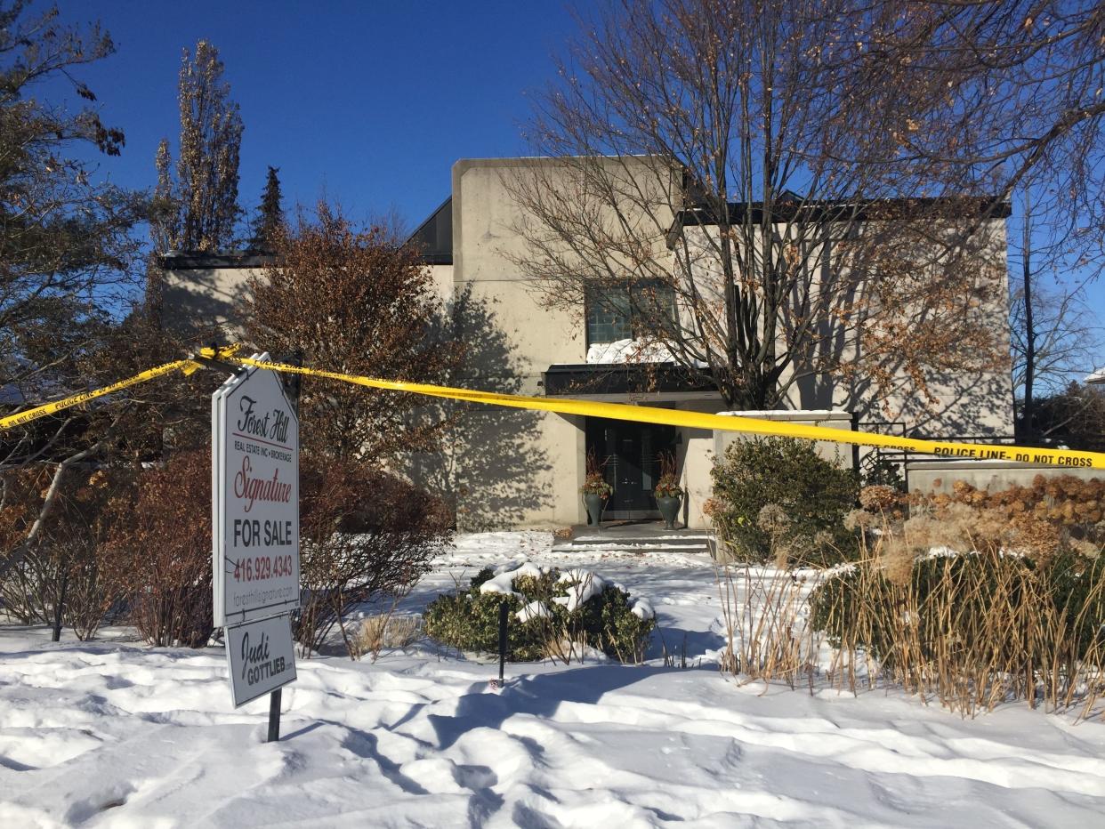 This Jan. 6, 2018 photo shows police crime scene tape marking off the property belonging to Barry and Honey Sherman, who were found strangled inside their home on Dec. 15, 2017.