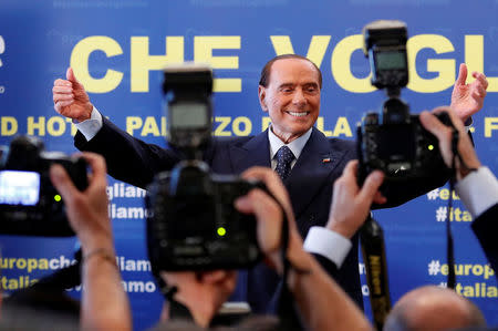 Forza Italia leader Silvio Berlusconi waves at the end of EPP European People's Party meeting in Fiuggi, Italy, September 17, 2017. REUTERS/Remo Casilli