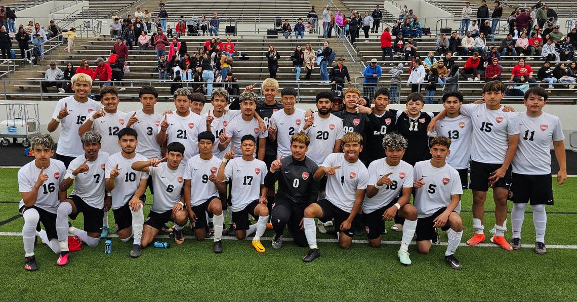 The Diamond Hill-Jarvis boys soccer team poses after defeating El Paso Irvin 2-0 in a Class 4A Region I semifinal on Friday, April 7, 2023 at Northwest ISD Stadium in Justin, Texas.