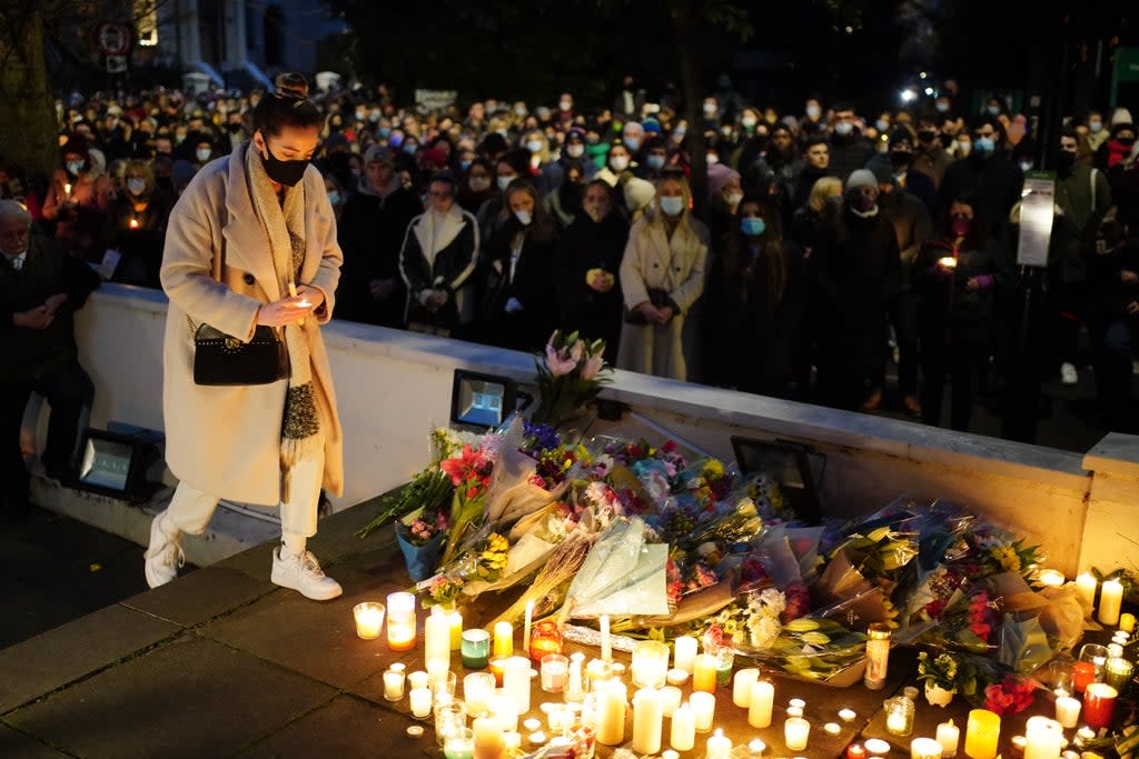 Floral tributes and candles are left after a vigil outside the London Irish Centre in Camden, London, in memory of Ashling Murphy (Dominic Lipinski/PA) (PA Wire)