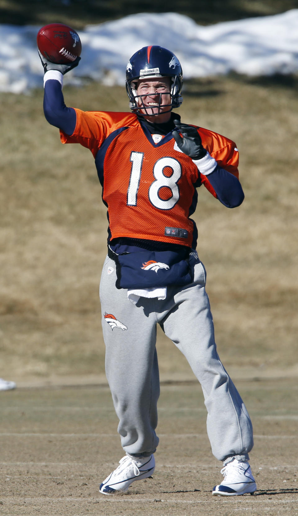 Broncos quarterback Peyton Manning throws a pass during NFL football practice at the team's training facility in Englewood, Colo., on Friday, Jan. 24, 2014. The Broncos are scheduled to play the Seattle Seahawks in Super Bowl XLVIII on Feb. 2. (AP Photo/Ed Andrieski)