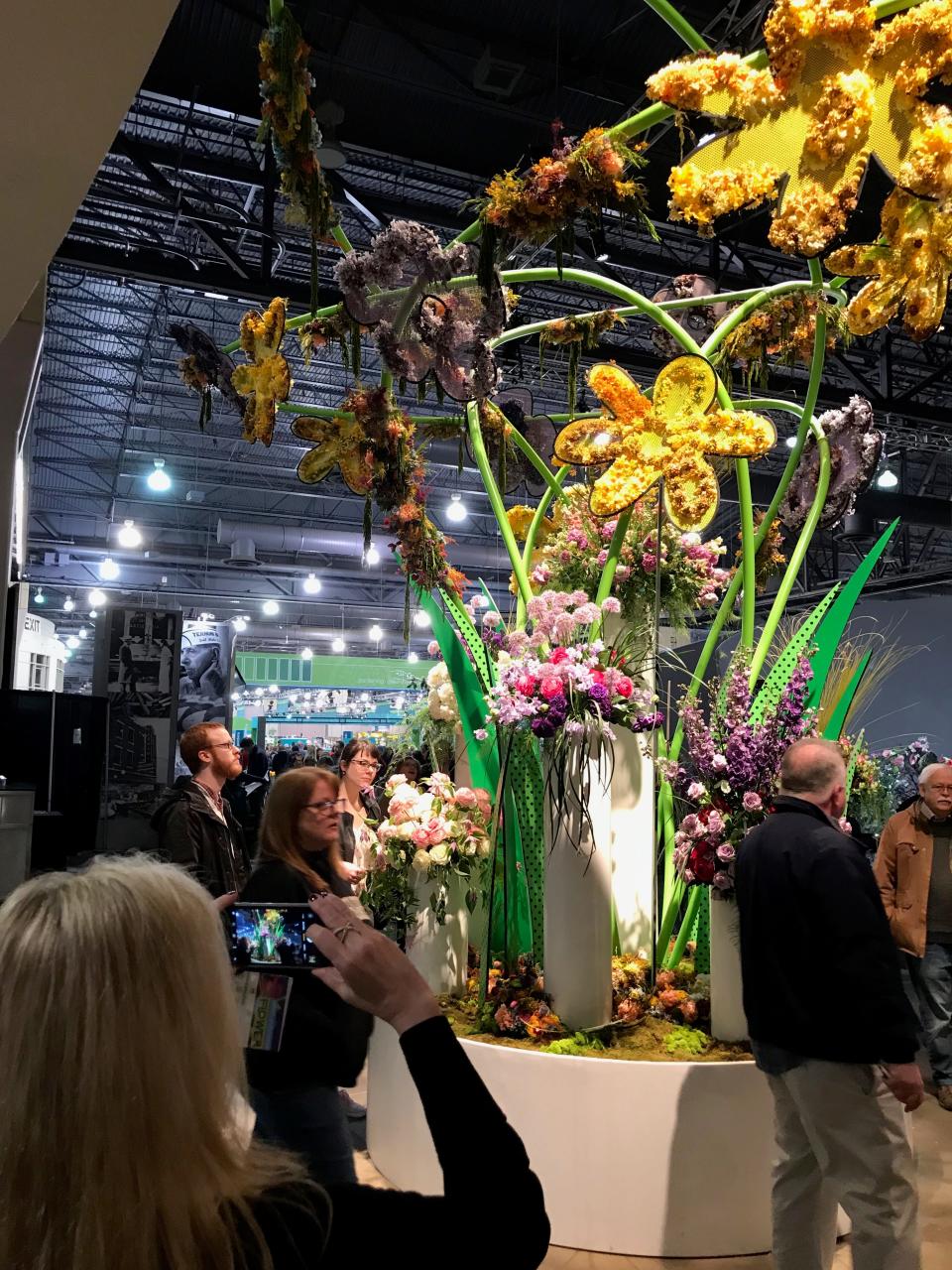 Pop art vines and flowers welcome guests to the 2019 Philadelphia Flower Show, which has "Flower Power" as its theme.
