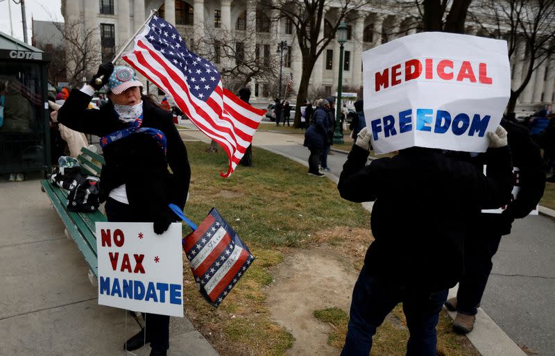 FILE PHOTO: Protestors demonstrate against COVID-19 vaccine mandates during rally outside New York State Capitol in Albany