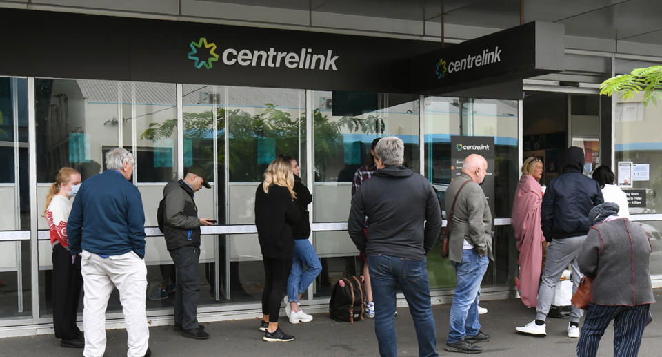 A long line outside a Centrelink office.