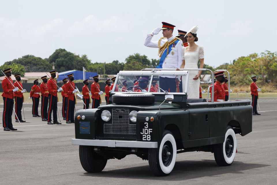 Catherine, Duchess of Cambridge and Prince William, Duke of Cambridge ride in a Land Rover as they attend the inaugural Commissioning Parade for service personnel from across the Caribbean, March 24, 2022, in Kingston, Jamaica. / Credit: Pool/Samir Hussein/WireImage