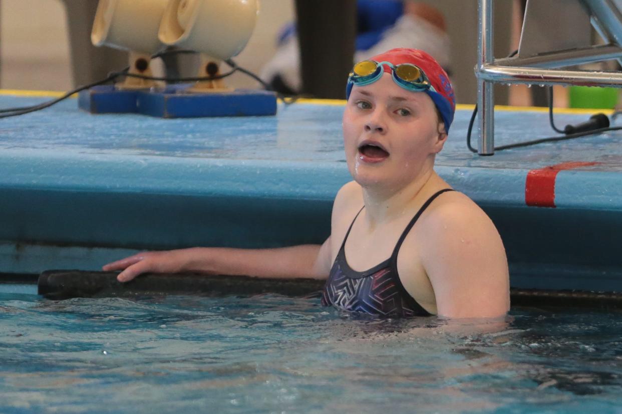 Seaman's Avery Walz completes reacts to her time in the 500 yard freestyle during Wednesday's Topeka High School Invitational at Capital Federal Natatorium.