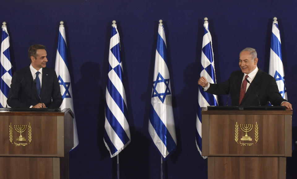 Israeli Prime Minister Benjamin Netanyahu, right, and Greek Prime Minister Kyriakos Mitsotakis give joint statements in Jerusalem, Tuesday, June 16, 2020. (Debbie Hill, UPI Pool via AP)