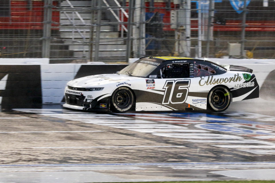 AJ Allmendinger races to a victory in a NASCAR Xfinity Series auto race at Charlotte Motor Speedway in Concord, N.C., Saturday, Oct. 10, 2020. (AP Photo/Nell Redmond)