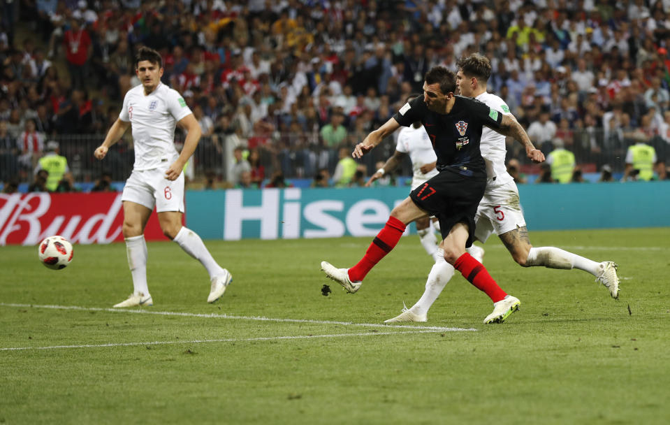 Croatia’s Mario Mandzukic scores the goal that beat England in the 2018 World Cup semifinals. (AP)