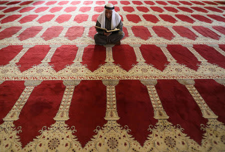 A Palestinian man prays inside al-Aqsa Mosque, the third holiest shrine in Islam, on the compound known to Muslims as al-Haram al-Sharif and to Jews as Temple Mount, in Jerusalem's Old City, May 10, 2017. REUTERS/Ammar Awad