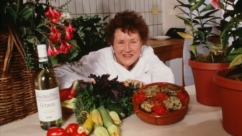 Julia child with ingredients and wine