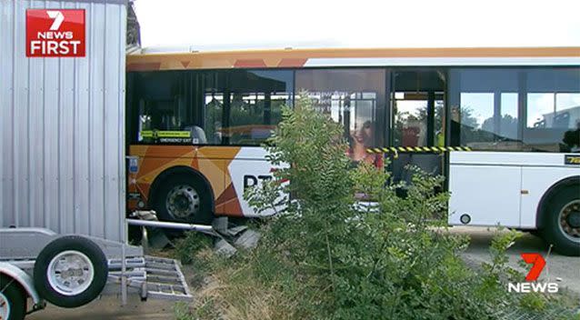 One of the buses went through a fence and crashed into a shed. Source: 7 News