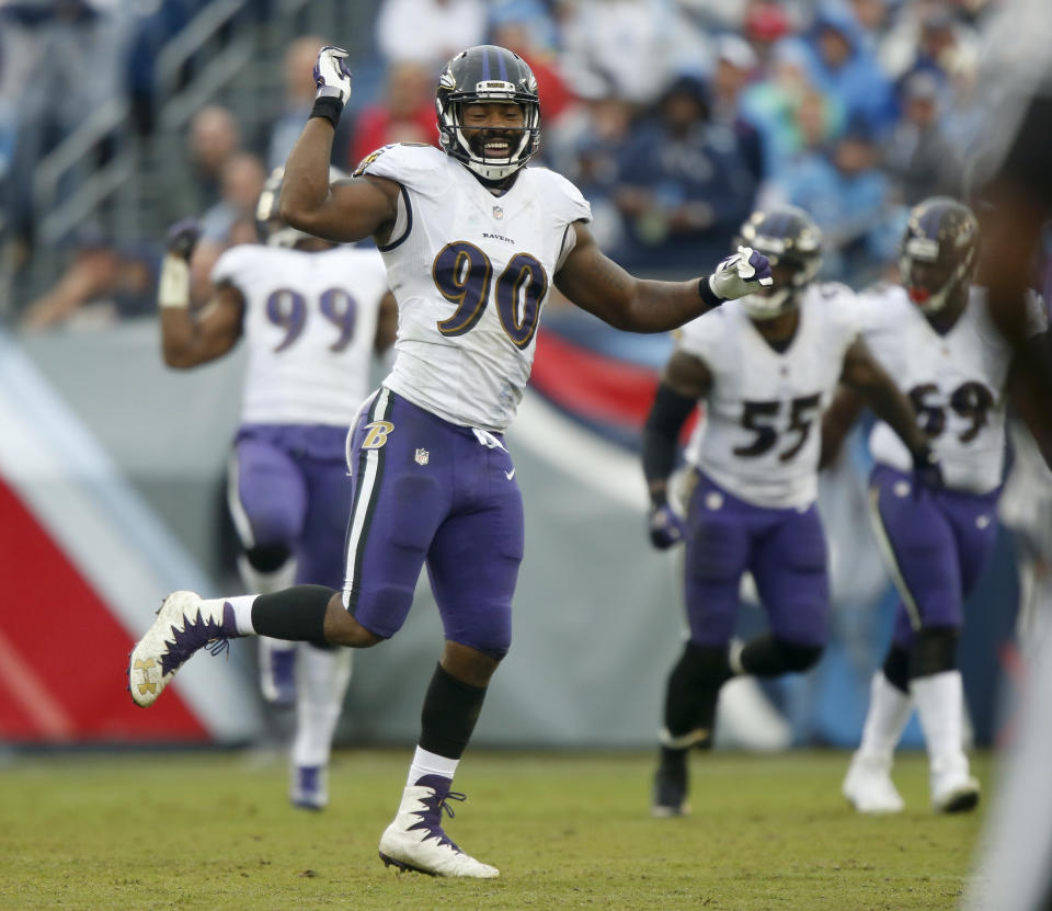 Baltimore Ravens linebacker Za'Darius Smith (90) celebrates after sacking Tennessee Titans quarterback Marcus Mariota and forcing a fumble in the first half of an NFL football game Sunday, Oct. 14, 2018, in Nashville, Tenn. The Titans recovered the ball on the play. (AP Photo/Wade Payne)