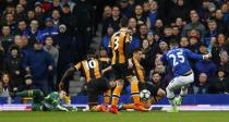 <p>Everton’s Ramiro Funes Mori shoots at goal as Hull City’s Curtis Davies and Eldin Jakupovic attempt to block </p>
